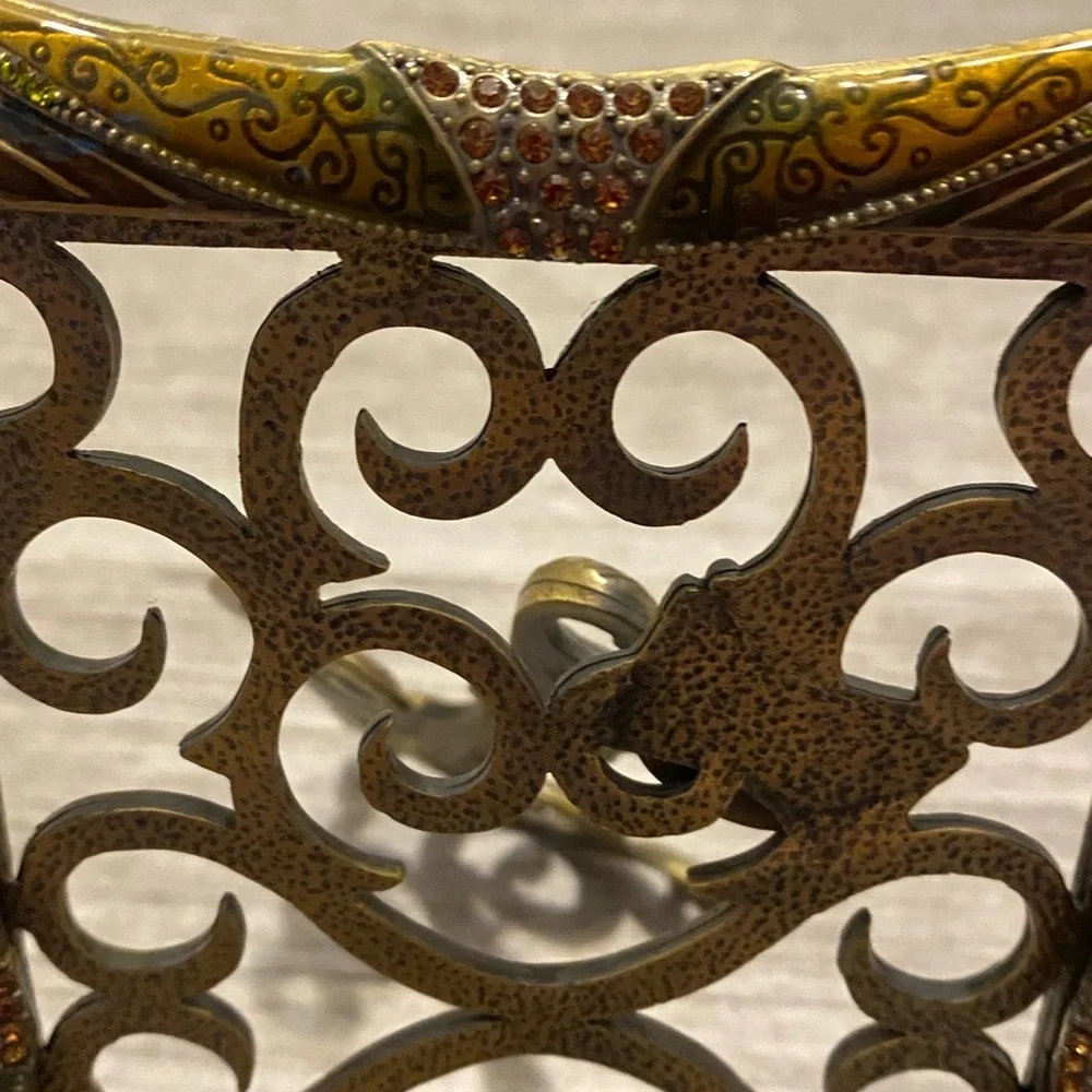 Stunning museum gold Frame with green enamel, light rust also has crystals.
